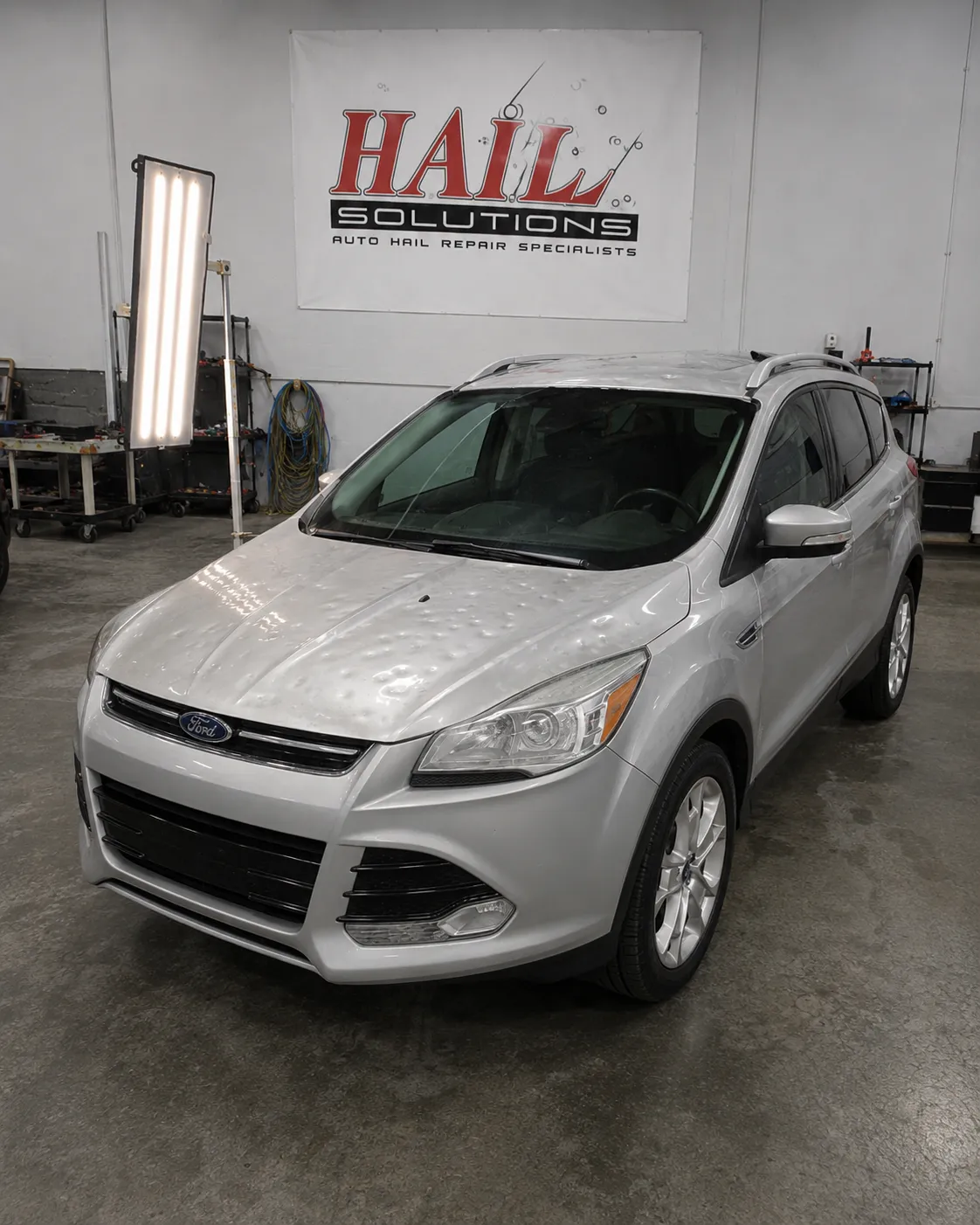 2016 Ford Escape hail damage repair in Olathe, KS — detail photo 1
