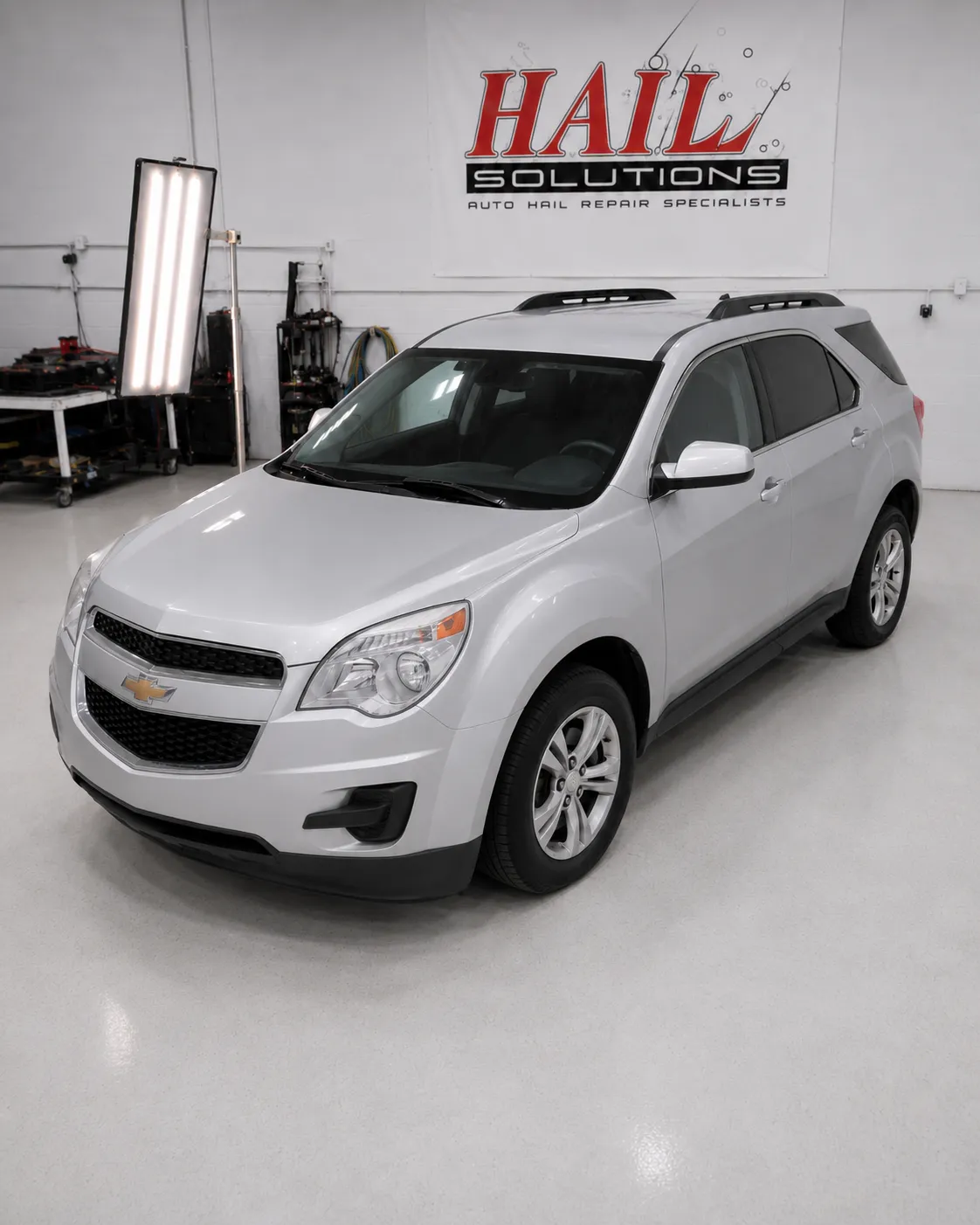 2015 Chevrolet Equinox — Silver Ice Metallic after hail damage repair by Hail Solutions in Independence, MO