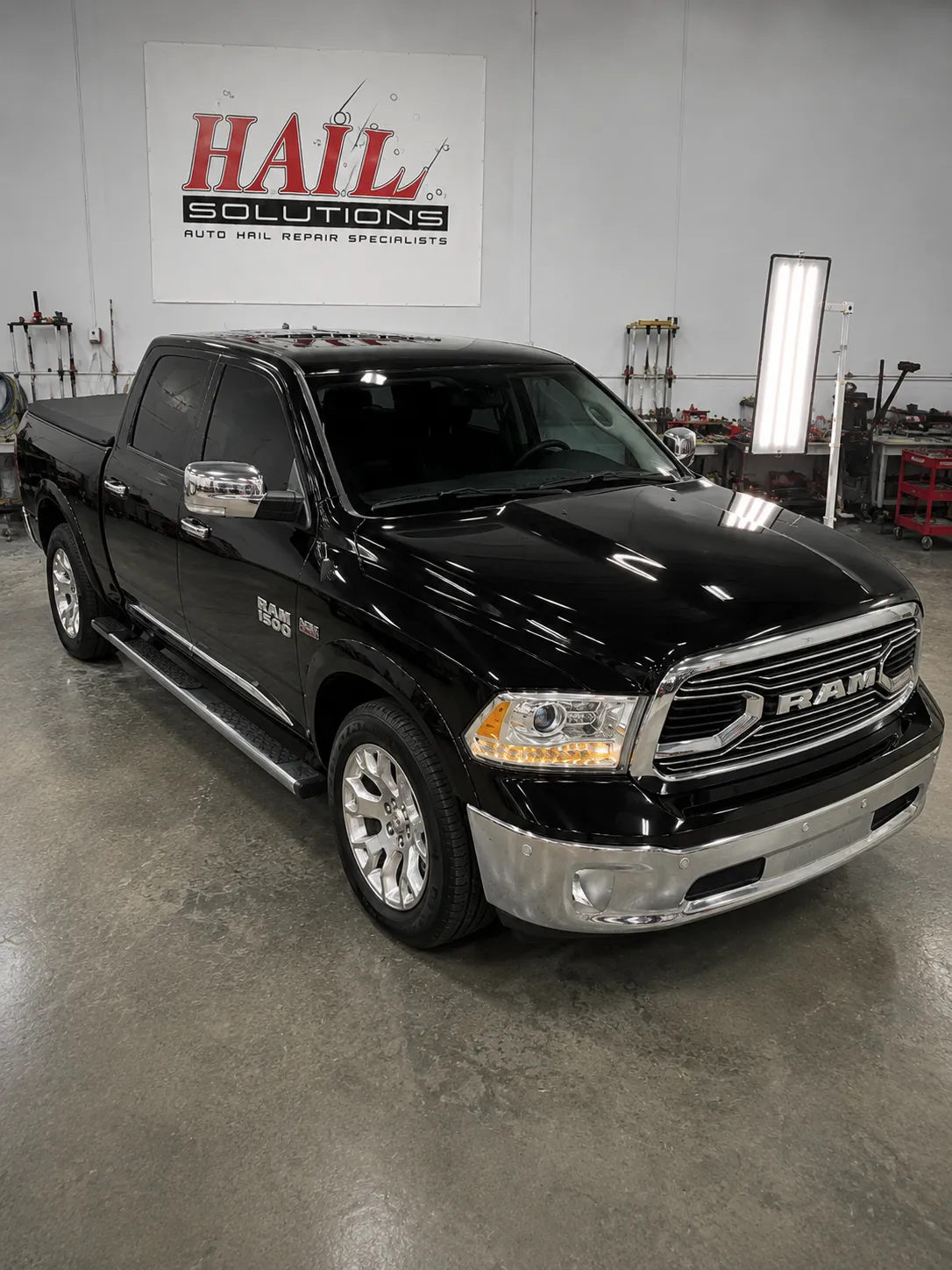 2015 Ram 1500 — Brilliant Black Crystal Pearl after hail damage repair by Hail Solutions in Smithville, MO