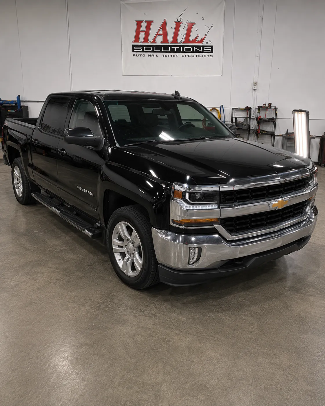 2016 Chevrolet Silverado 1500 — Black after hail damage repair by Hail Solutions in Ottawa, KS