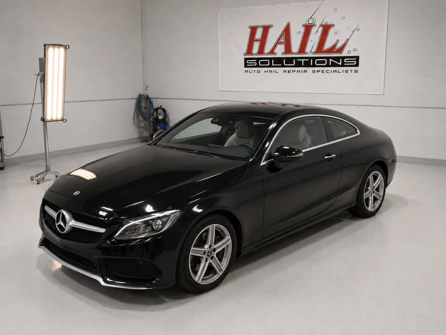 2017 Mercedes-Benz C-Class — Obsidian Black after hail damage repair by Hail Solutions in Edgerton, KS