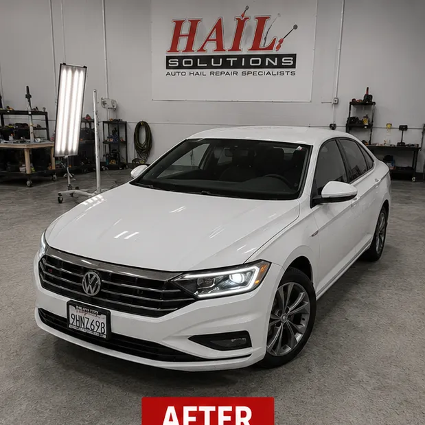 2019 Volkswagen Jetta — Pure White after hail damage repair by Hail Solutions in Paola, KS