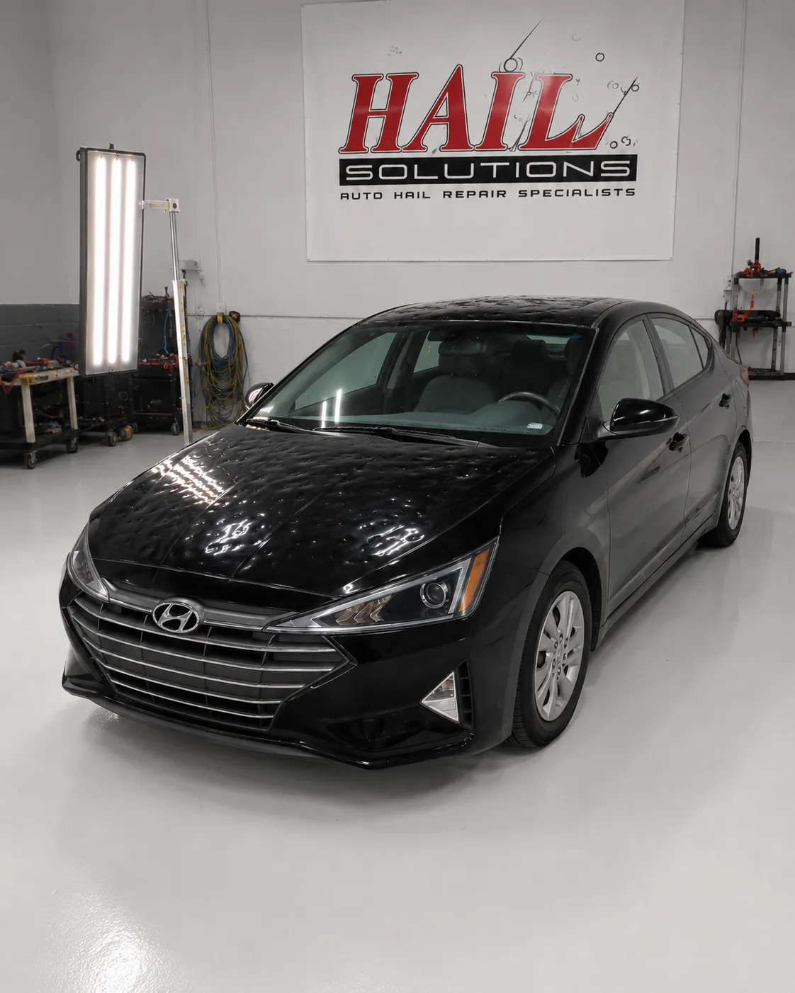 2020 Hyundai Elantra — Phantom Black after hail damage repair by Hail Solutions in Grain Valley, MO